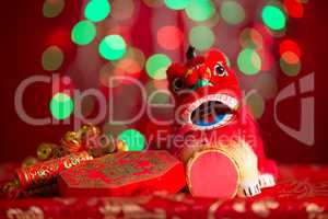 Chinese New Year decorations on red glitter background
