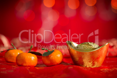 Chinese New Year decorations gold ingot and mandarin orange