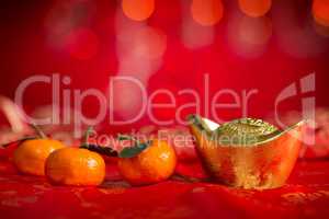 Chinese New Year decorations gold ingot and mandarin orange