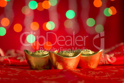 Chinese New Year decorations gold ingots with copy space
