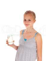 Girl holding a glass of milk.