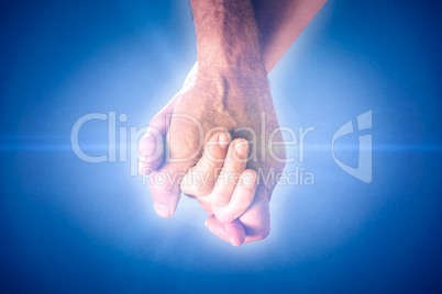 Composite image of happy senior couple holding hands Composite image of happy senior couple holding hands