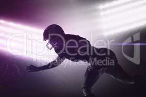 Composite image of silhouette american football player jumping