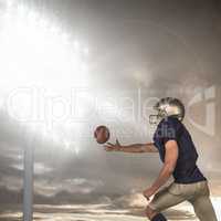 Composite image of american football player trying to catch the