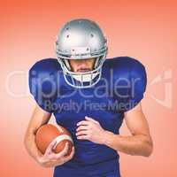 Composite image of sports player wearing helmet while holding ba