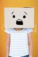 Composite image of depressed woman with box over head