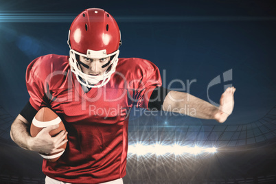 Composite image of american football player wrestling through an