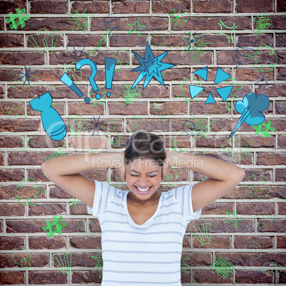 Composite image of angry woman covering ears