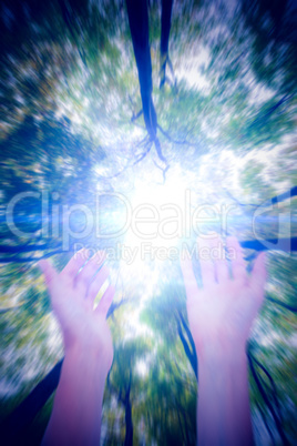 Composite image of woman presenting with her hands