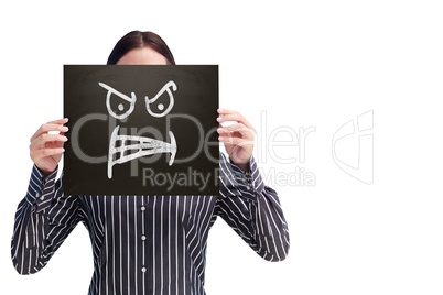 Composite image of businesswoman showing board