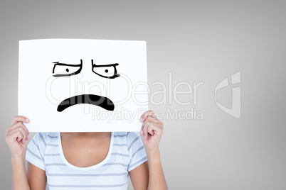 Composite image of woman holding blank sign in front of face