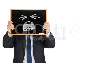 Composite image of businessman showing board