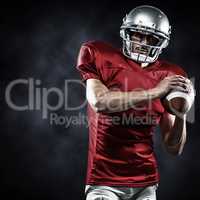 Composite image of confident american football player in red jer