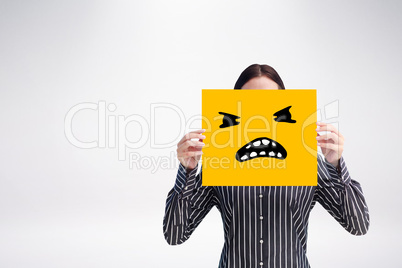 Composite image of smiling woman showing a big business card in