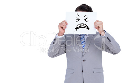 Composite image of businessman holding blank sign in front of hi