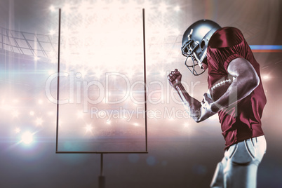 Composite image of american football player in mid-air