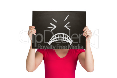 Composite image of casual woman showing board