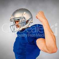 Composite image of american football player looking away while f
