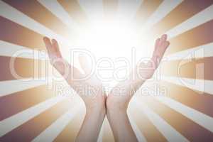 Composite image of woman presenting with her hands
