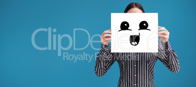Composite image of smiling woman showing a big business card in