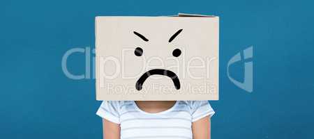 Composite image of depressed woman with box over head