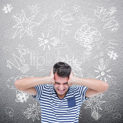 Composite image of frustrated man covering ears