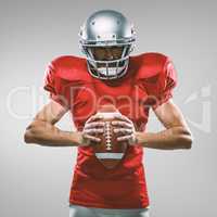 Composite image of furious american football player in red jerse