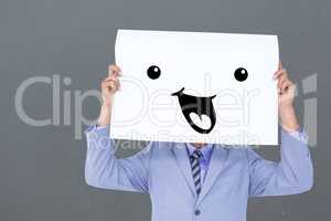 Composite image of  portrait of a businessman hiding his face be