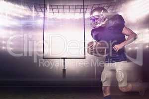 Composite image of american football player holding ball in mid-