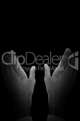 Composite image of businessman holding hand out in presentation