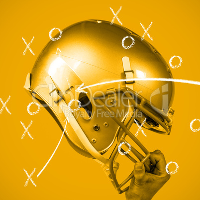 Composite image of american football player handing his sliver h