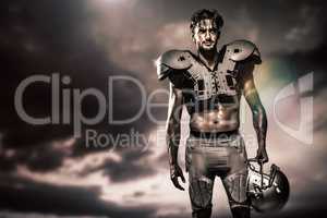 Composite image of shirtless american football player with paddi