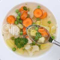 Gesunde Ernährung Gemüsesuppe Gemüse Suppe essen auf Löffel