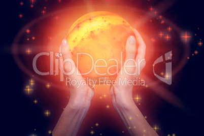 Composite image of fortune teller holding crystal ball