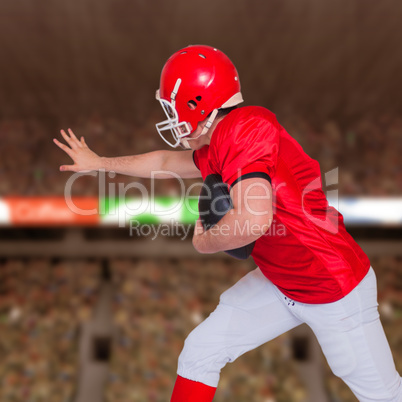 Composite image of american football player running with the bal