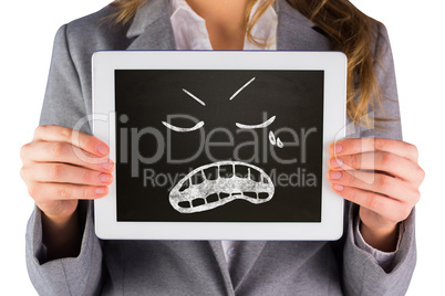 Composite image of businesswoman showing tablet