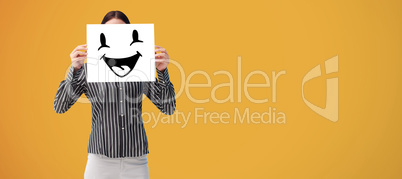 Composite image of businesswoman showing a white card in front o