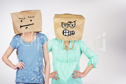 Composite image of woman posing with bag on head