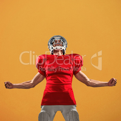 Composite image of aggressive american football player in red je