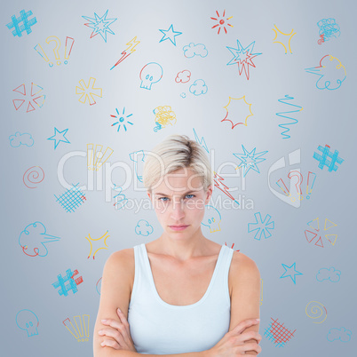 Composite image of upset blonde looking at camera with arms cros