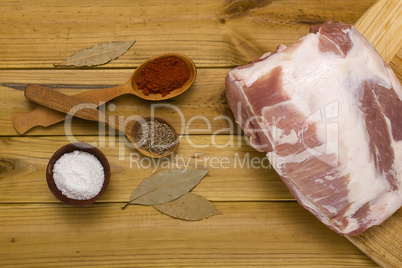 Spices in wooden spoons for cooking meat