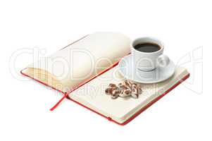 notebook and cup of coffee isolated on white background