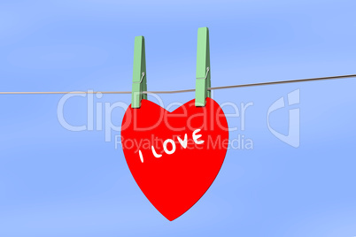 Heart hanging on the clothesline