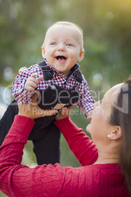 Little Baby Boy Having Fun With Mommy Outdoors