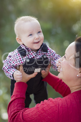 Little Baby Boy Having Fun With Mommy Outdoors