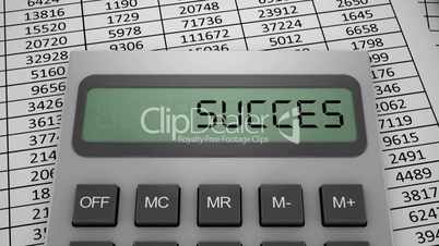 Calculator The calculator displays the word "Success"
