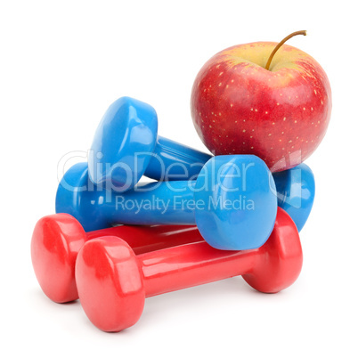 Set dumbbells and apple