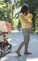 Mother and baby in a park