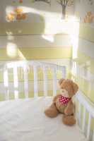 Teddy bear in a baby room
