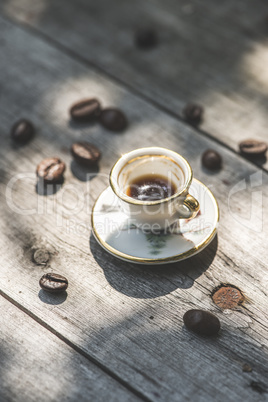 Cup of coffee on wooden table